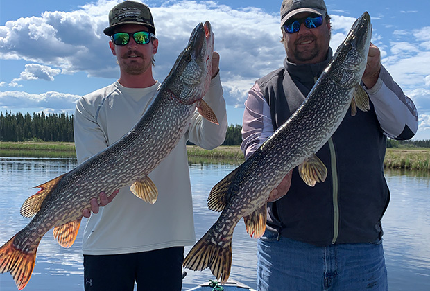 Ric McNulty Group Members with two Giant Pike