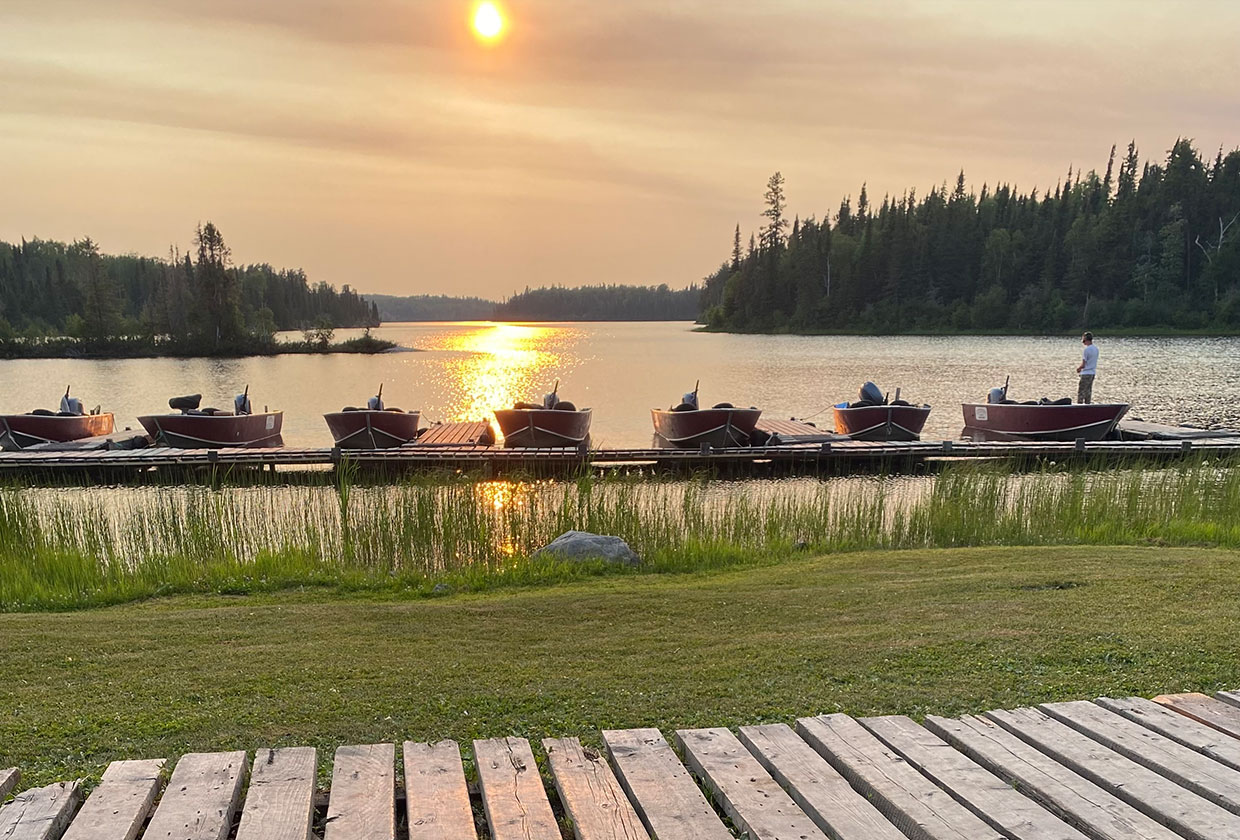 Boats lined up at dawn ready to go fishing